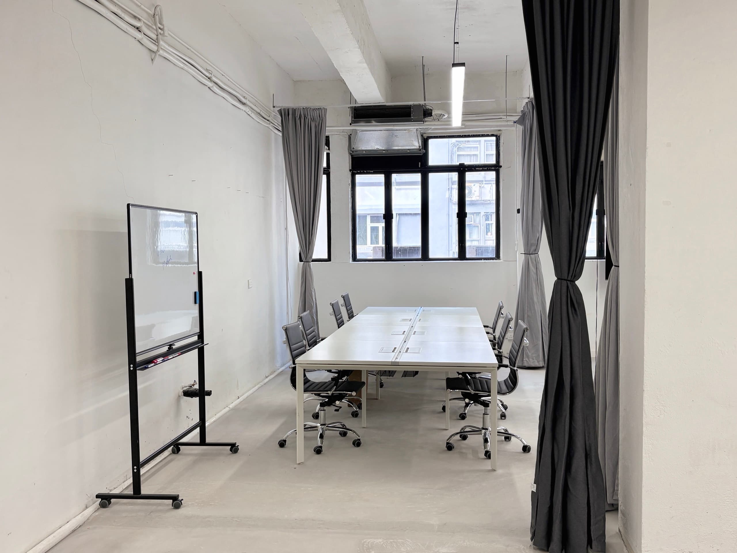 Desks in the open workspace at OpenStudio